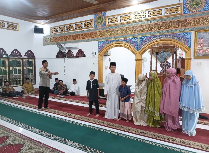 Kapolsek Benai Menghadirkan Pembukaan MTQ di Desa Tebing Tinggi Simandolak.