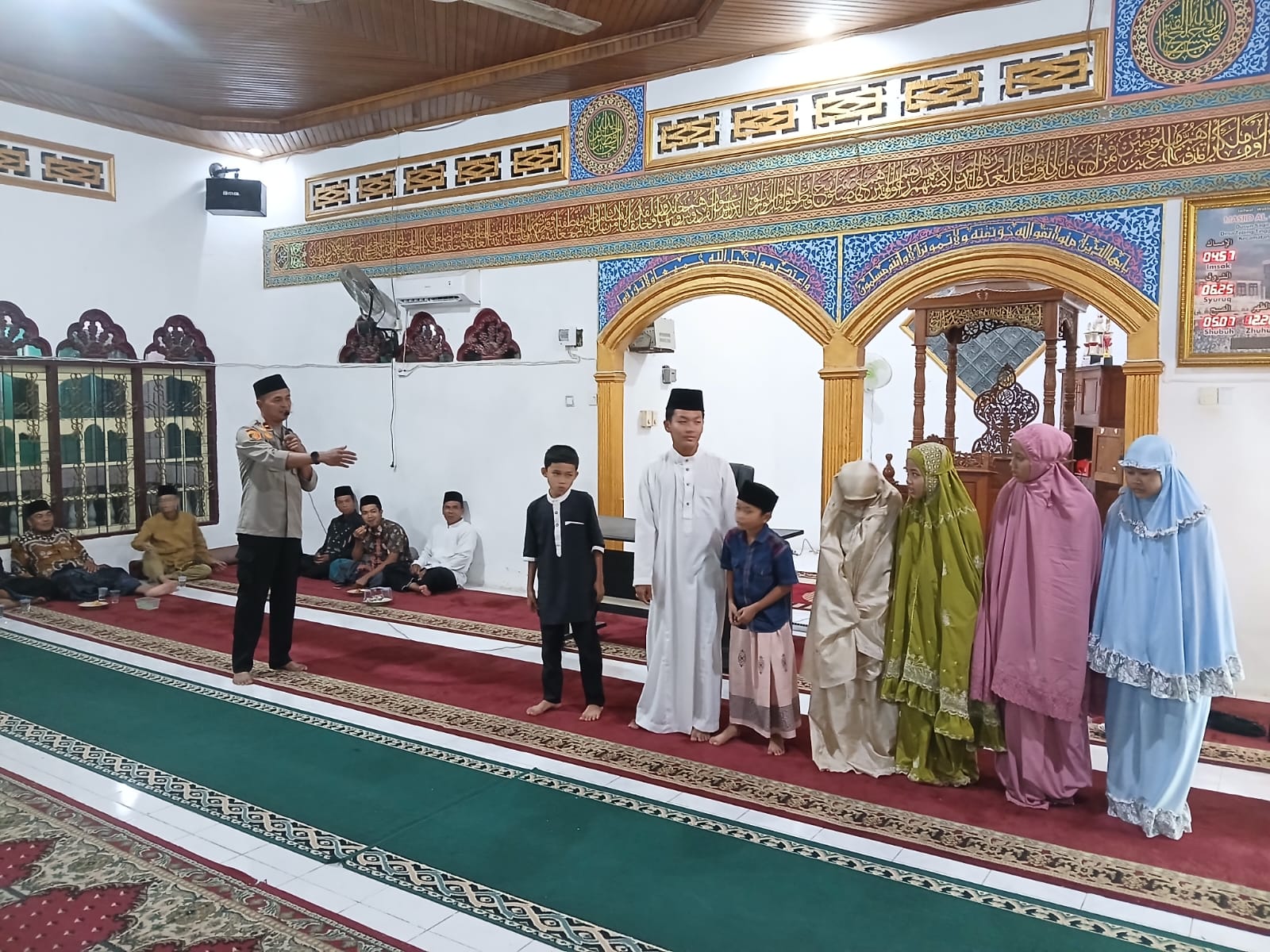 Kapolsek Benai Menghadirkan Pembukaan MTQ di Desa Tebing Tinggi Simandolak.